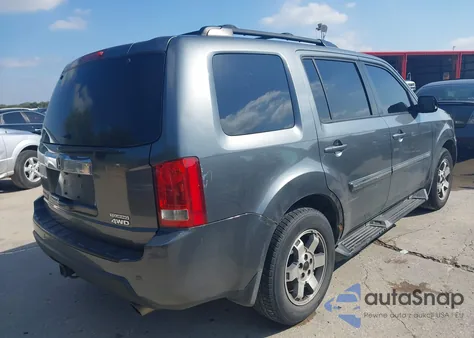 2010 Honda Pilot Touring z USA, uszkodzony, nr VIN 5FNYF4H91AB032731